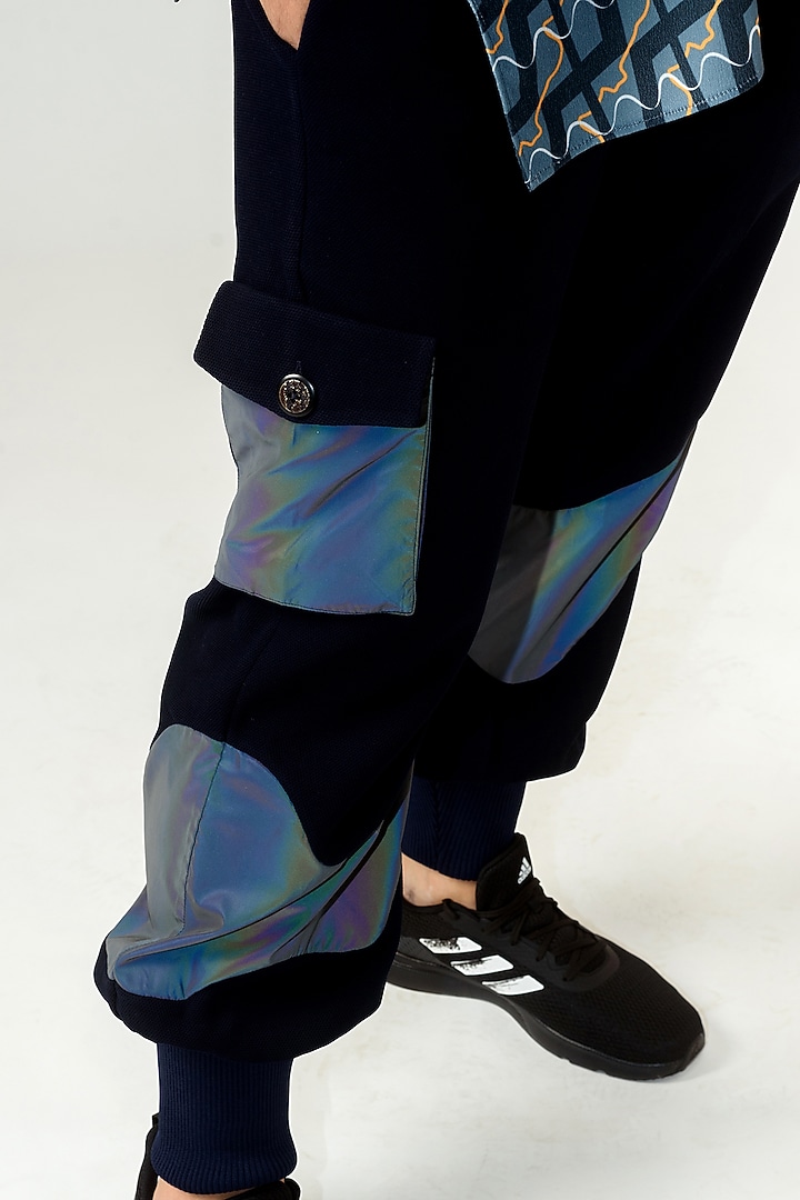 Navy Blue Poly Knit Textured Crepe Trousers by Siddhant Agrawal Men at Pernia's Pop Up Shop