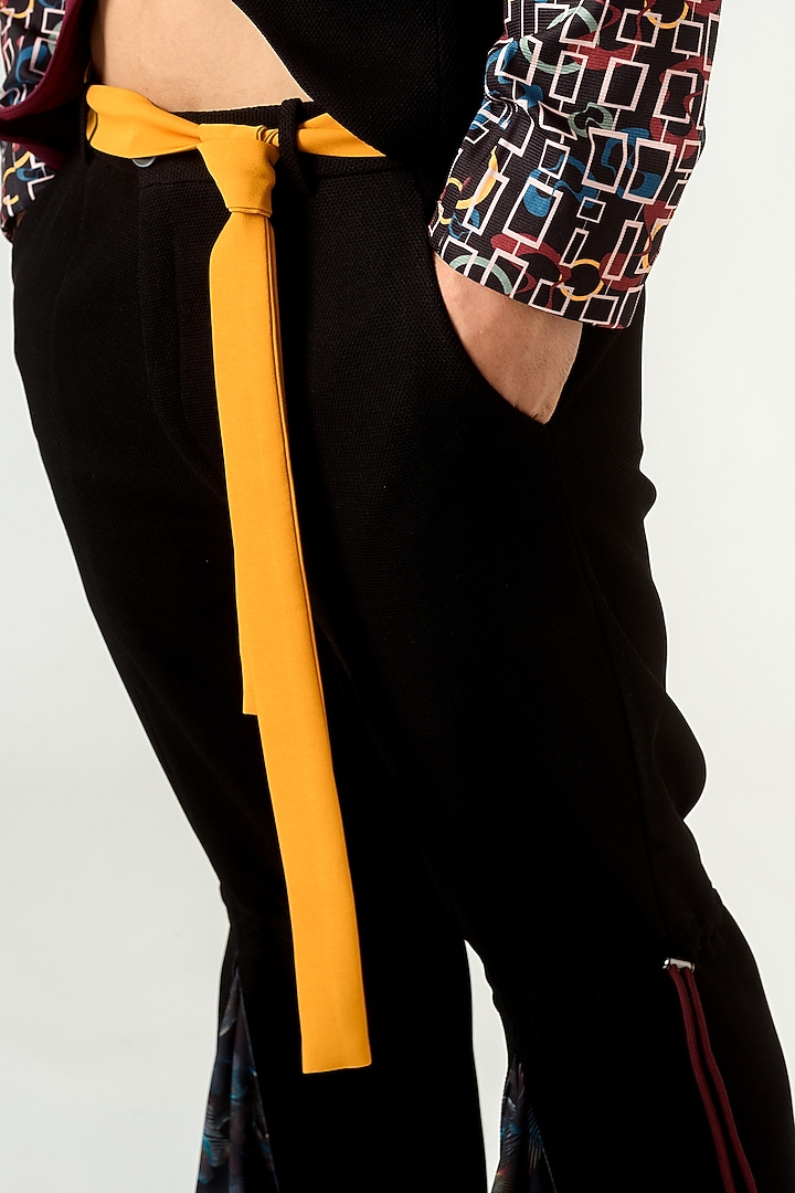 Black Textured Flared Trousers With Belt by Siddhant Agrawal Men at Pernia's Pop Up Shop