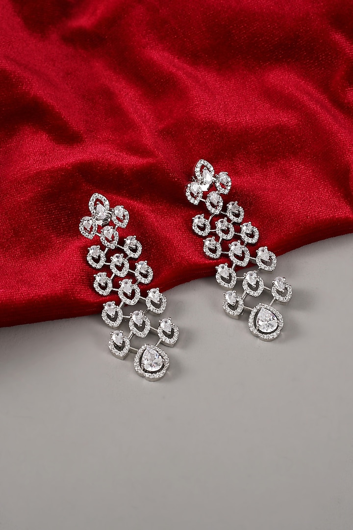 White Rhodium Finish Zircon Dangler Earrings In Sterling Silver by Silver Ishq at Pernia's Pop Up Shop