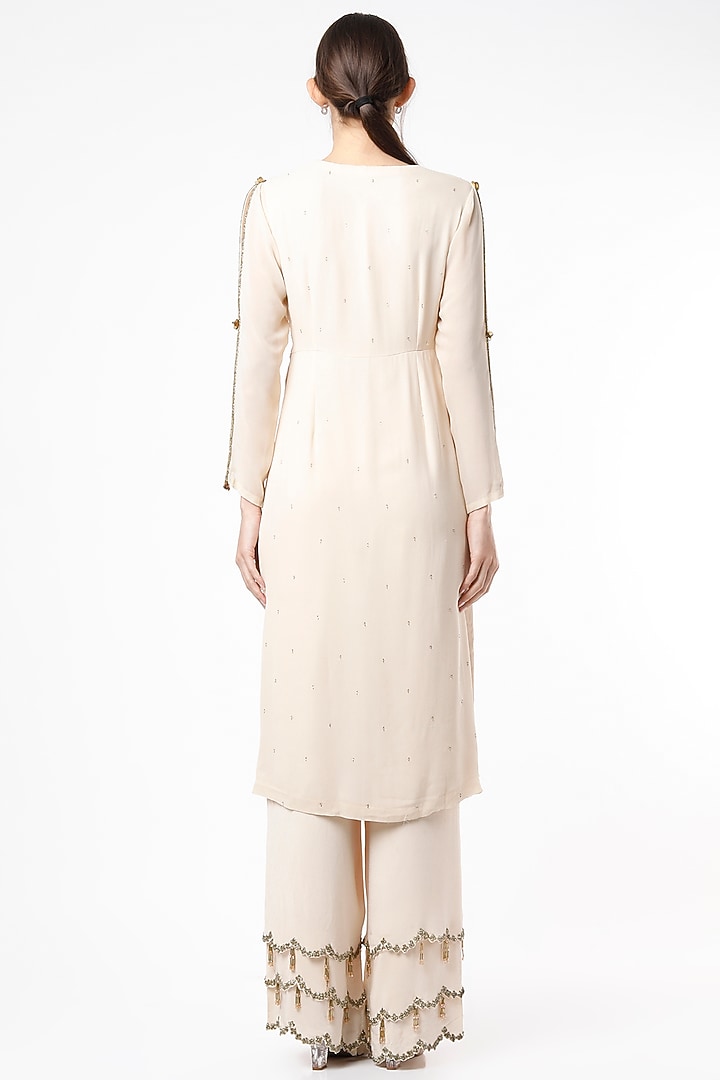 Ivory Embroidered Kurta Set by SIMRAT MARWAH at Pernia's Pop Up Shop