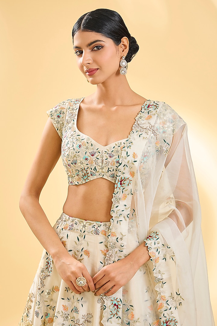 Ivory Dupion Silk Floral Hand Embroidered Bridal Lehenga Set by Simar Dugal at Pernia's Pop Up Shop
