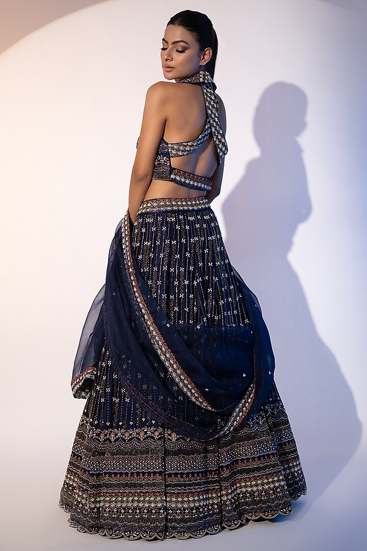 Navy blue Pure Raw Silk Pearl & Tassels Embellished Bridal Lehenga Set by SEJAL KUMAR at Pernia's Pop Up Shop