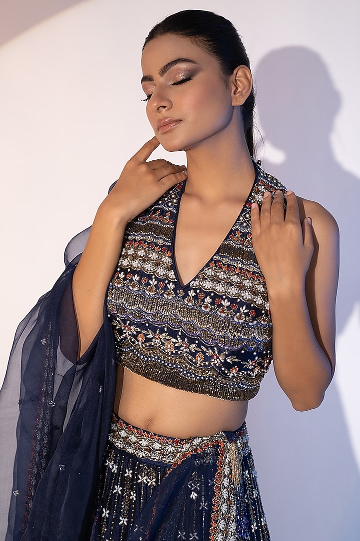 Navy blue Pure Raw Silk Pearl & Tassels Embellished Bridal Lehenga Set by SEJAL KUMAR at Pernia's Pop Up Shop