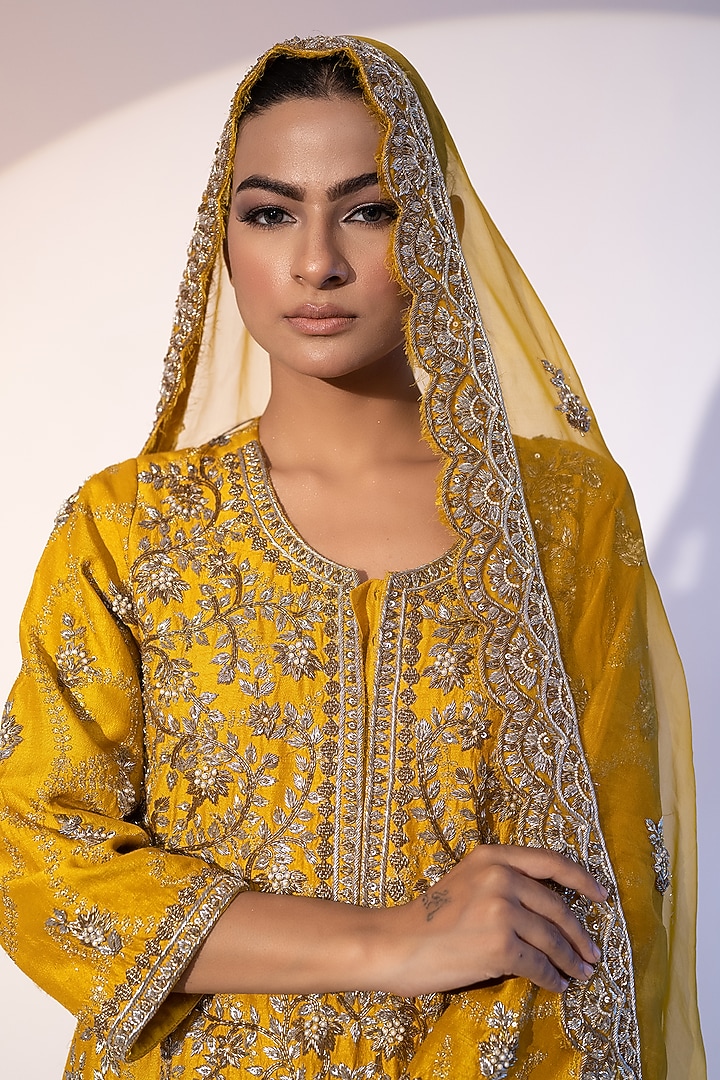 Mustard Pure Raw Silk Motifs Embroidered Bridal Sharara Set by SEJAL KUMAR at Pernia's Pop Up Shop