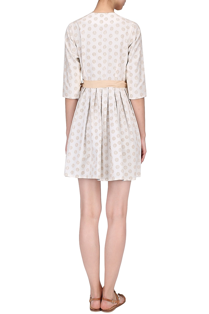 Pink reversible box pleated dress available only at Pernia's Pop Up Shop.
