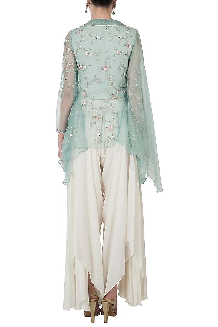 Emerald embellished jacket with ivory top and drape pants by Shreya Jalan Mehta at Pernia's Pop Up Shop