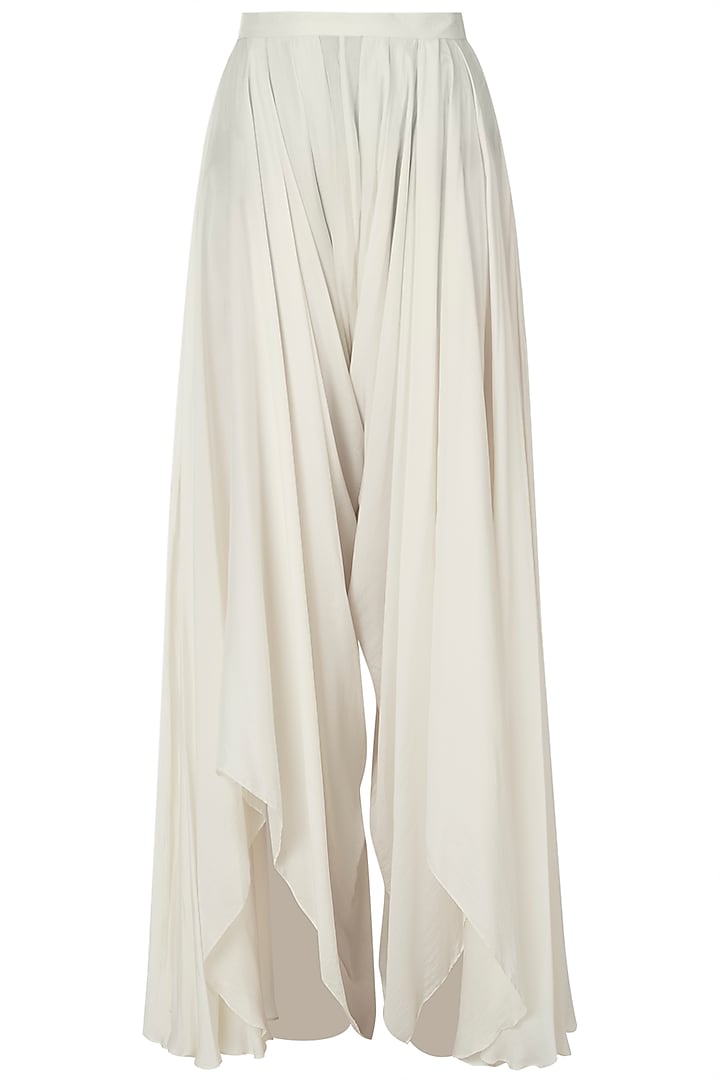 Emerald embellished jacket with ivory top and drape pants by Shreya Jalan Mehta at Pernia's Pop Up Shop