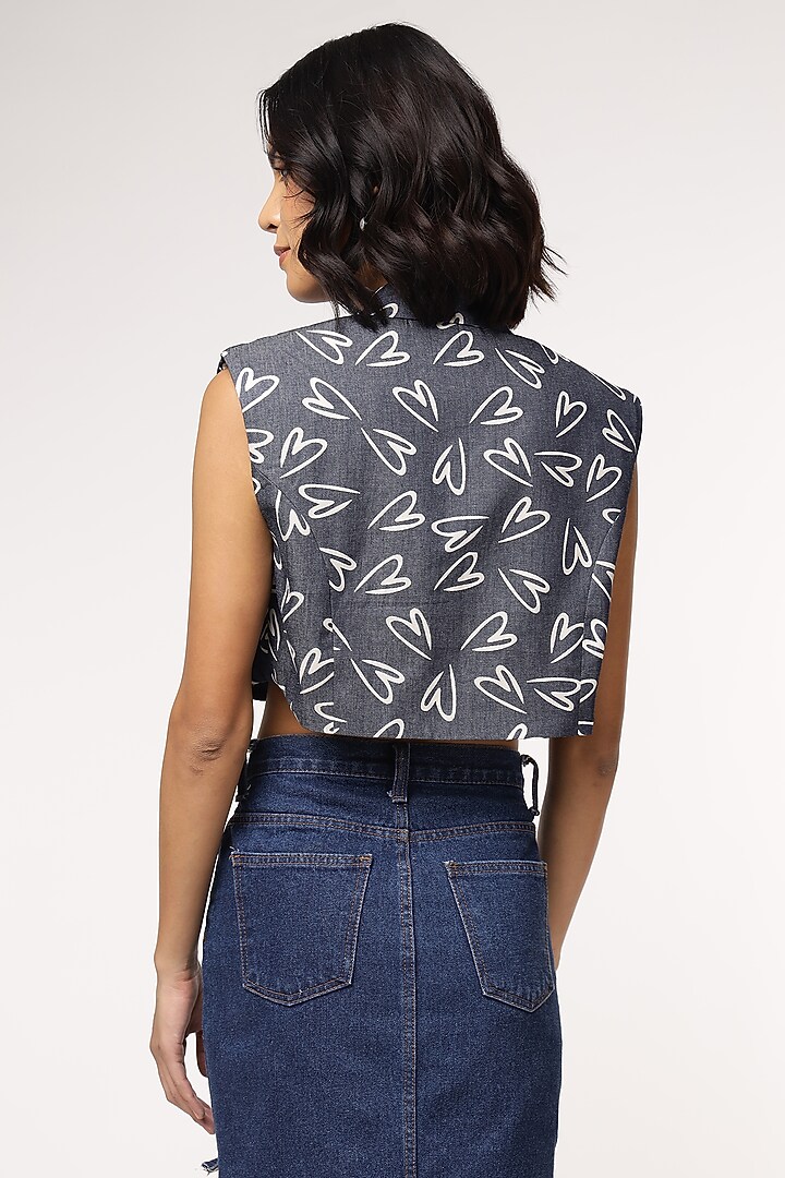 Blue Tencel Denim Heart Printed Sleeveless Jacket by Sakshi Khetterpal at Pernia's Pop Up Shop