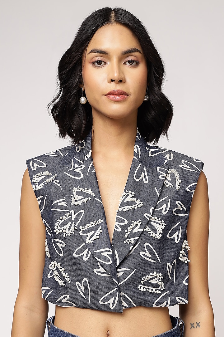 Blue Tencel Denim Heart Printed Sleeveless Jacket by Sakshi Khetterpal at Pernia's Pop Up Shop