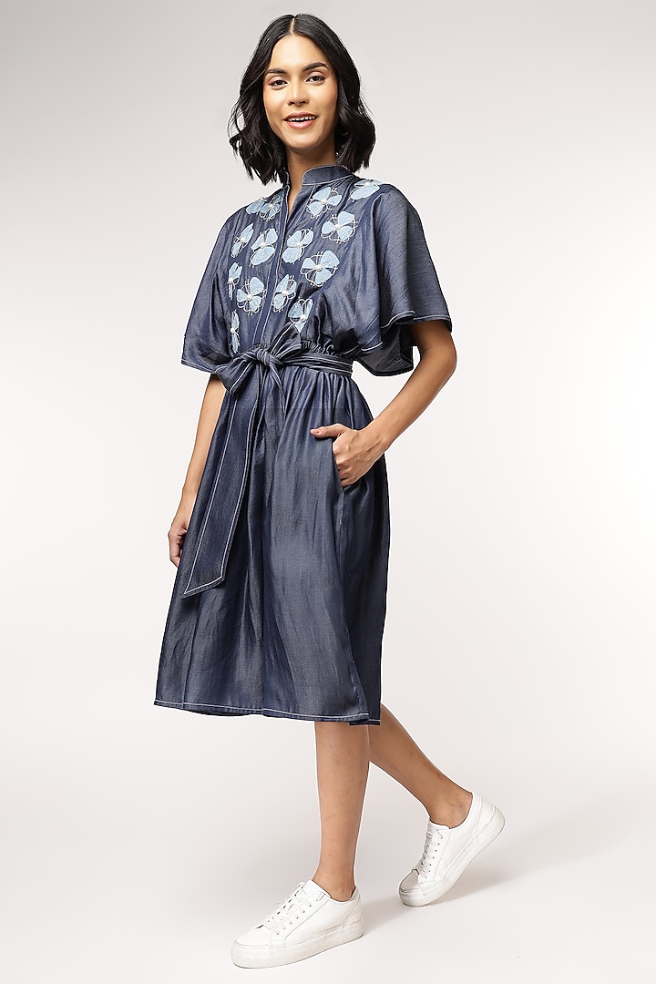 Blue Tencel Denim Floral Embroidered Vacation Dress With Belt by Sakshi Khetterpal at Pernia's Pop Up Shop