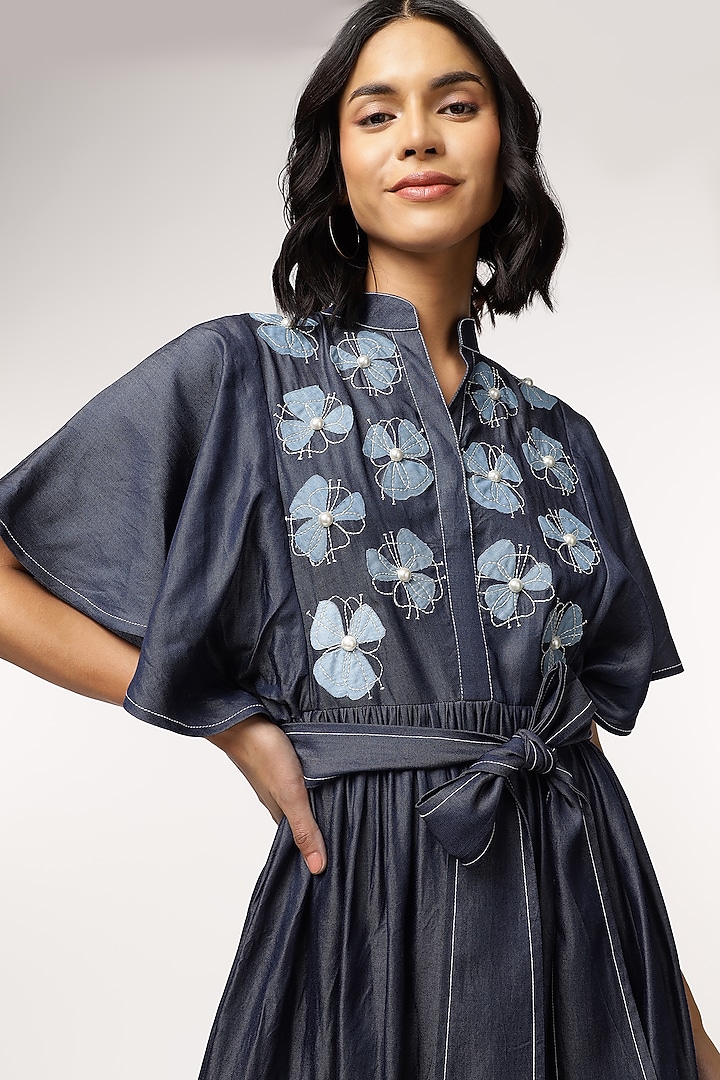 Blue Tencel Denim Floral Embroidered Vacation Dress With Belt by Sakshi Khetterpal at Pernia's Pop Up Shop