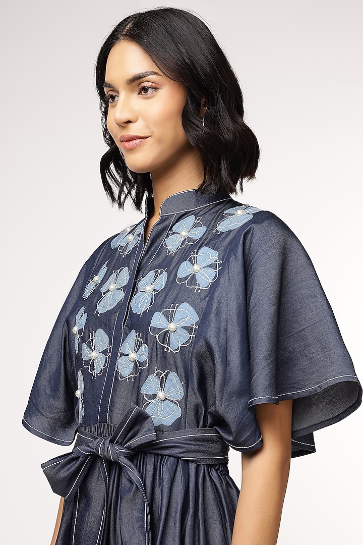 Blue Tencel Denim Floral Embroidered Vacation Dress With Belt by Sakshi Khetterpal at Pernia's Pop Up Shop
