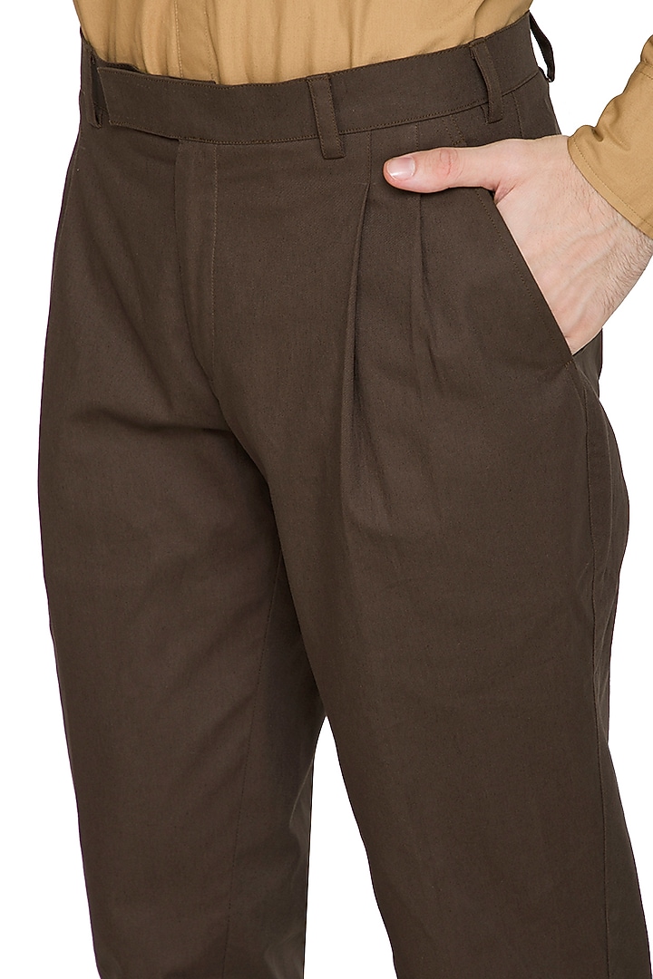 Brown Pleated Trouser Pants by Shikha Malik Men at Pernia's Pop Up Shop