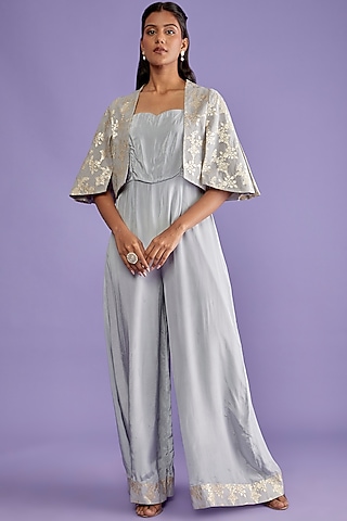 Grey Crepe Flared Jumpsuit With Cape by Sk'n