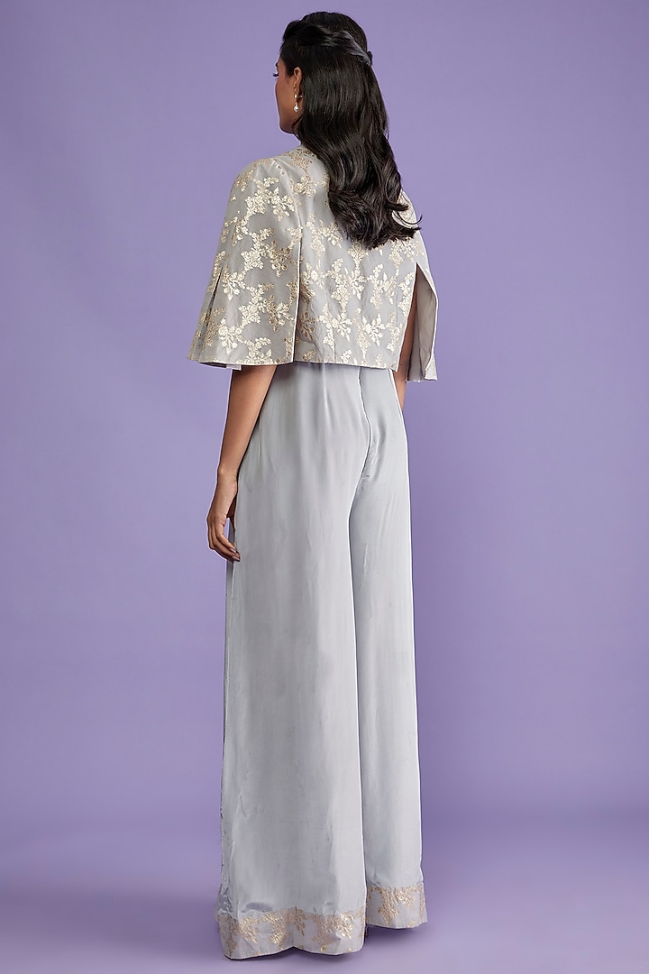 Grey Crepe Flared Jumpsuit With Cape by Sk'n at Pernia's Pop Up Shop