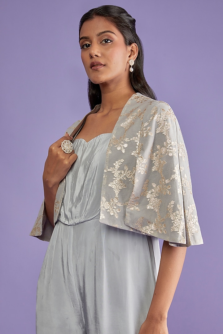 Grey Crepe Flared Jumpsuit With Cape by Sk'n at Pernia's Pop Up Shop