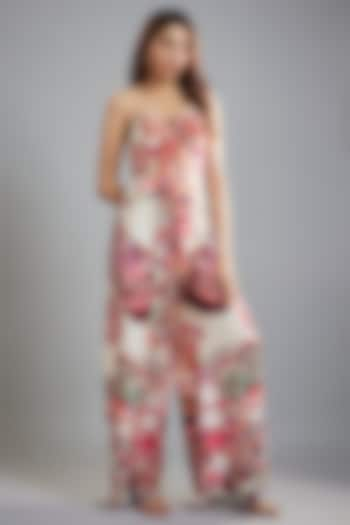 Ivory Satin & Chiffon Ikat Printed Halter Neck Jumpsuit With Belt by Saaksha & Kinni at Pernia's Pop Up Shop