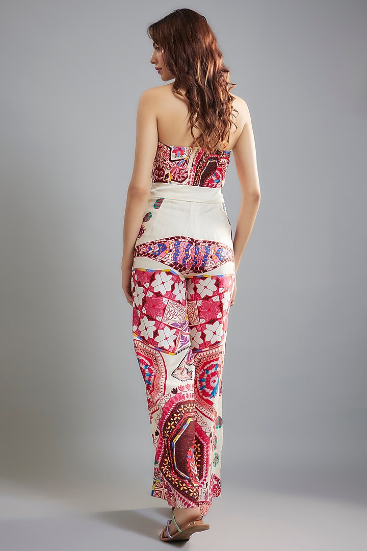 Ivory Satin & Chiffon Ikat Printed Halter Neck Jumpsuit With Belt by Saaksha & Kinni at Pernia's Pop Up Shop