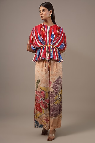 Peach Satin Bandhani Printed Palazzo Pants by Saaksha & Kinni