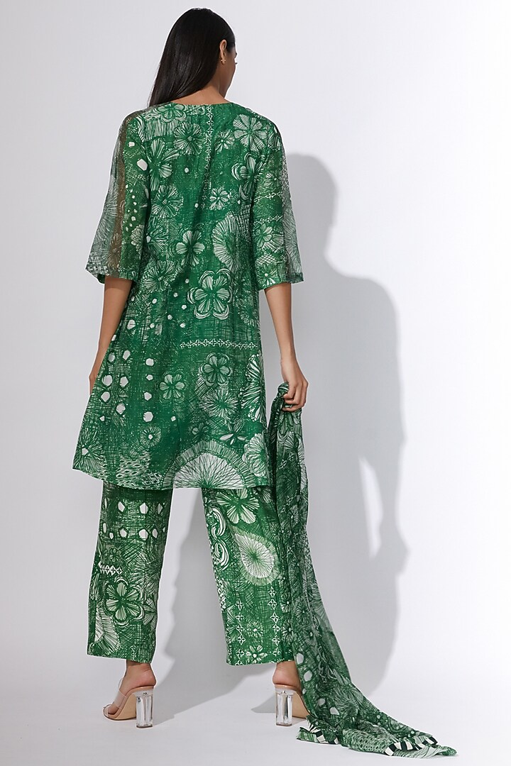 Green Floral Printed Trousers by Saaksha & Kinni at Pernia's Pop Up Shop
