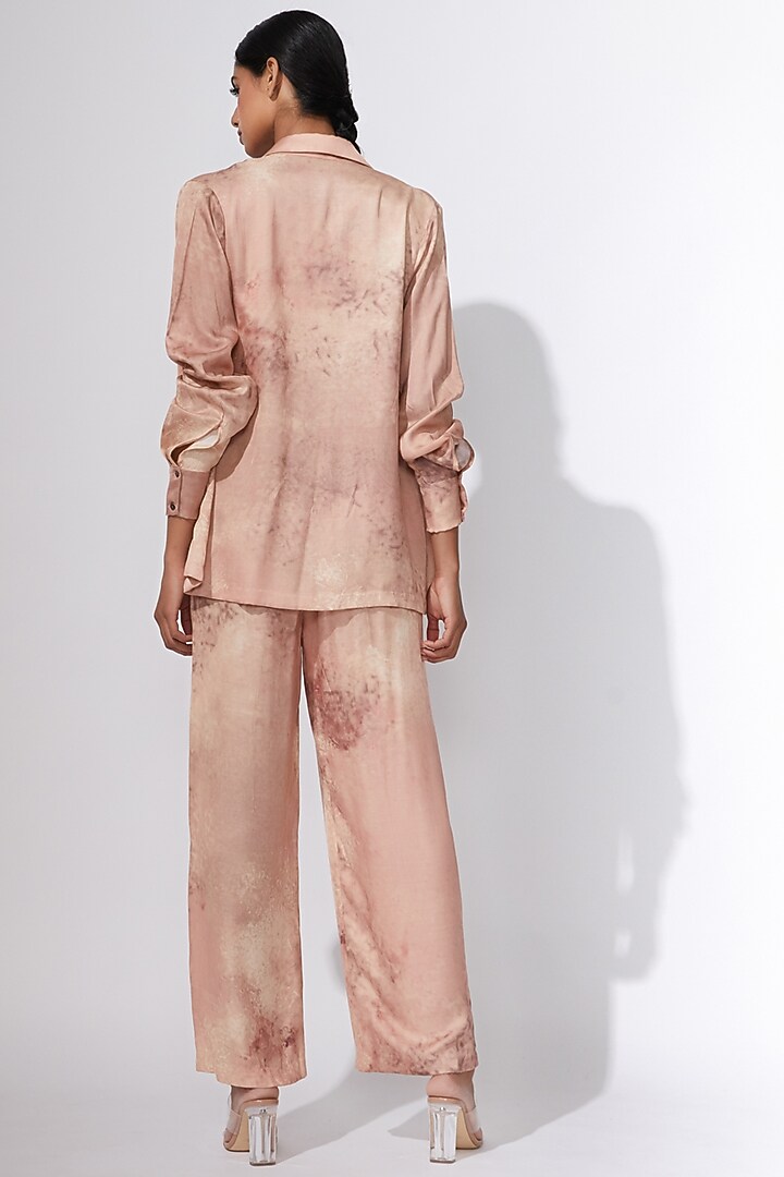 Peach Satin Printed Trousers by Saaksha & Kinni at Pernia's Pop Up Shop