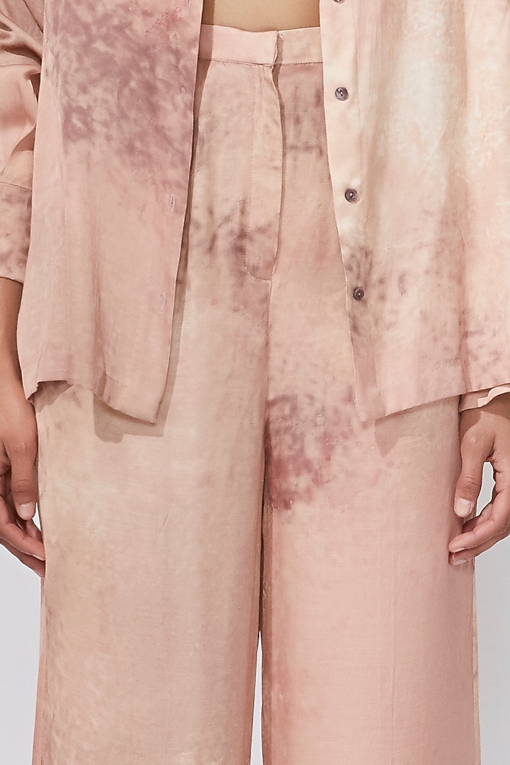 Peach Satin Printed Trousers by Saaksha & Kinni at Pernia's Pop Up Shop