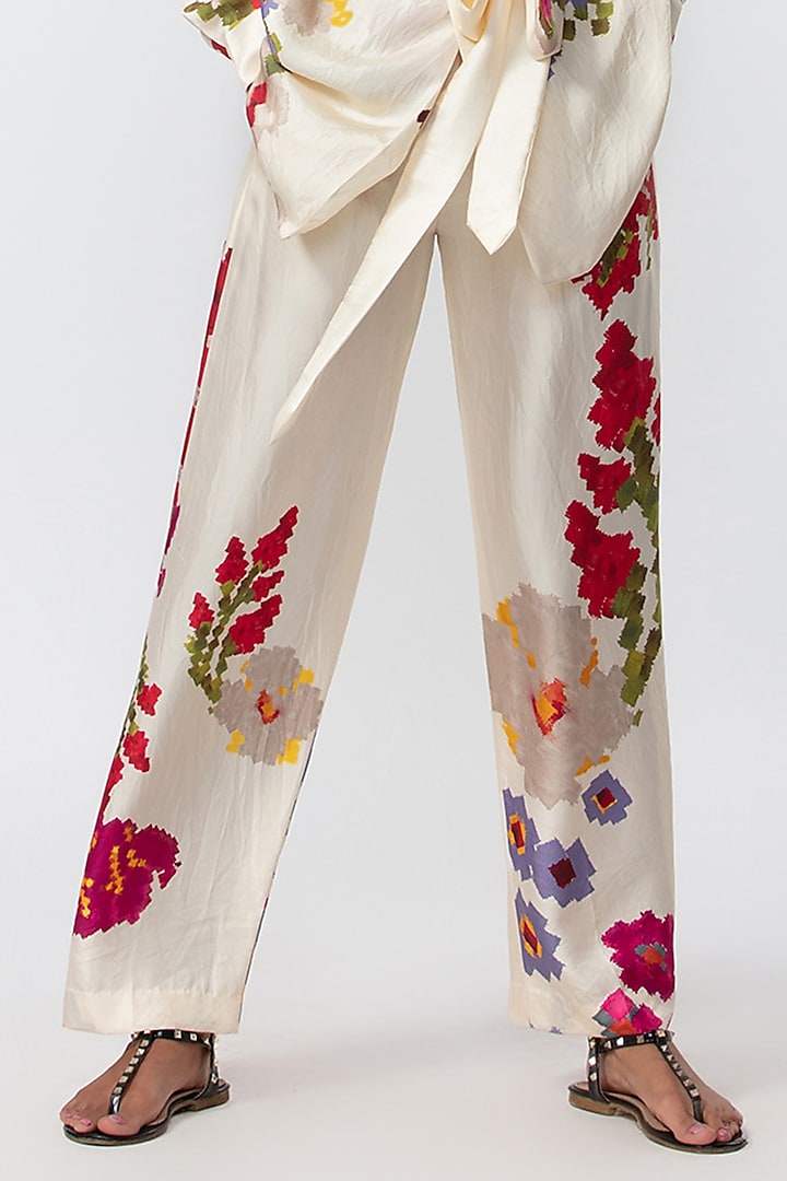 Ivory Silk Abstract Printed Trousers by Saaksha & Kinni