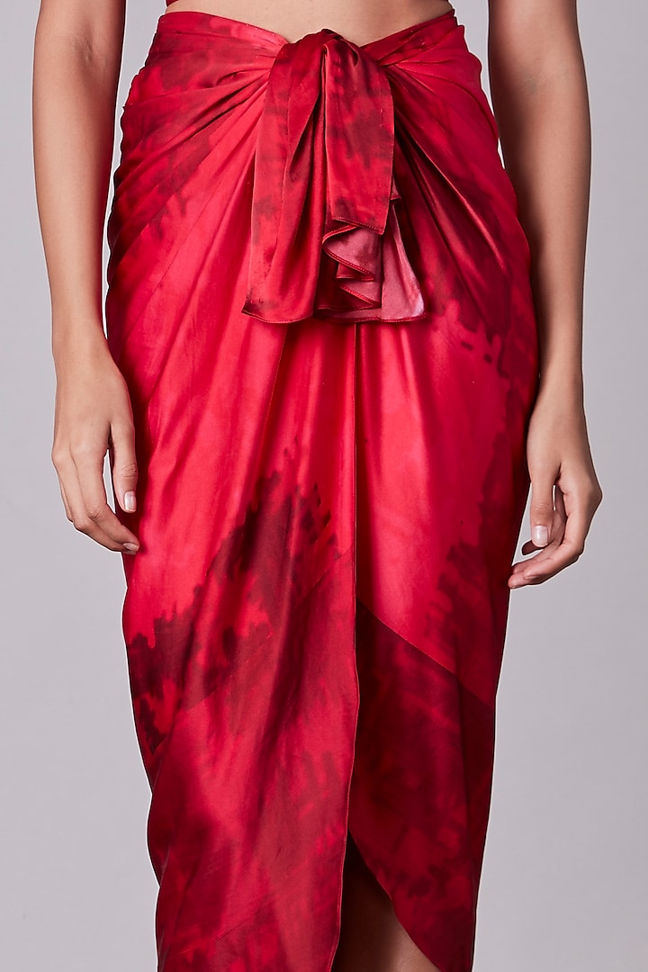 Cherry Satin Printed Asymmetrical Wrap Skirt by Saaksha & Kinni