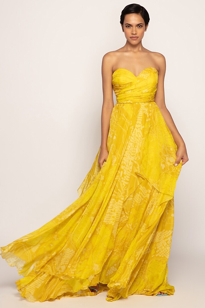 Yellow Chiffon Bandhani Printed Gown by Saaksha & Kinni
