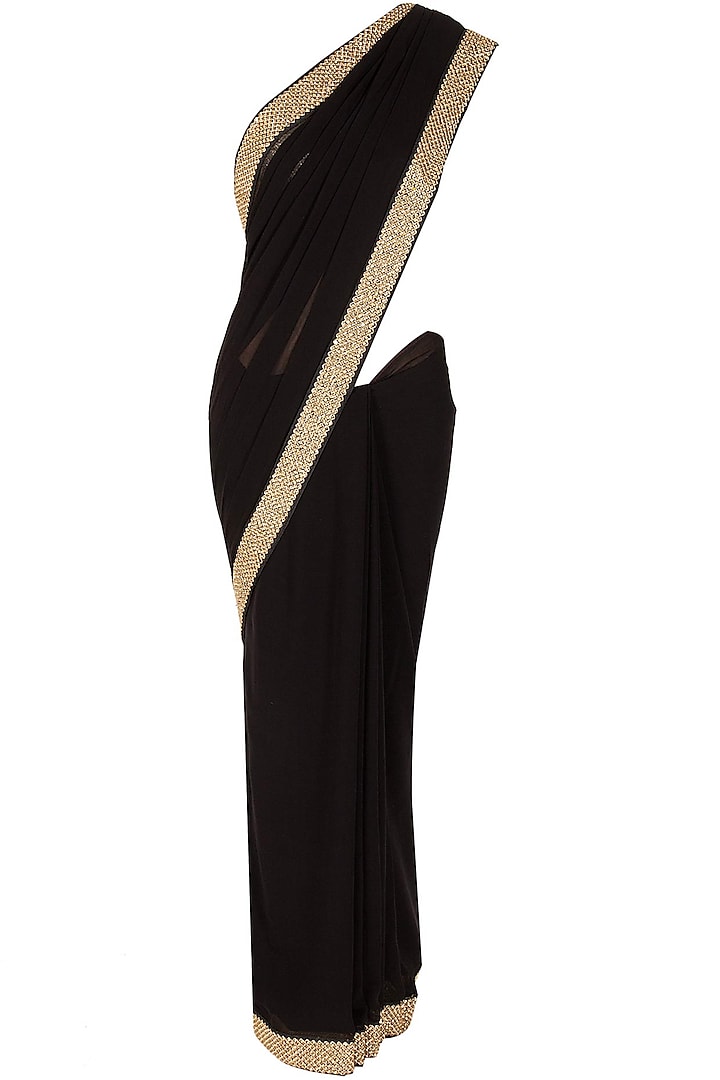 Black and gold embroidered sari by Sonal Kalra Ahuja
