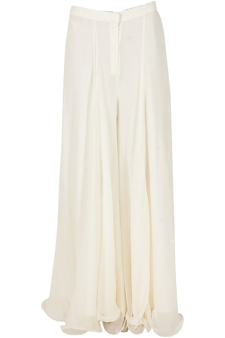 Ivory and gold peplum sharara set available only at Pernia's Pop-Up Shop.