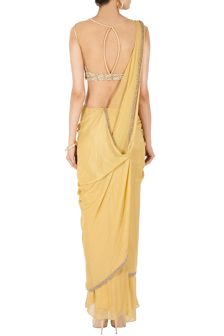 Gold dust draped sari available only at Pernia's Pop-Up Shop.