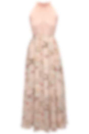 Blush pink printed maxi skirt with halter neck blouse by Sonal Kalra Ahuja