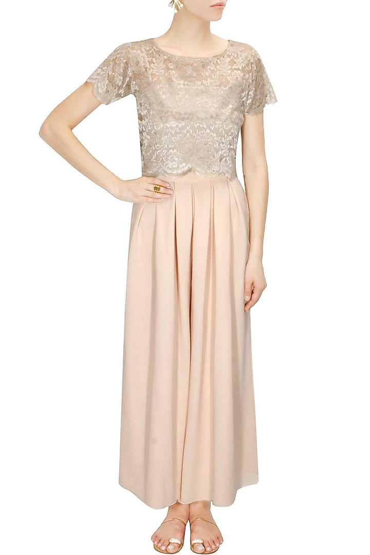 Blush pink pleated flared pants available only at Pernia's Pop-Up Shop.