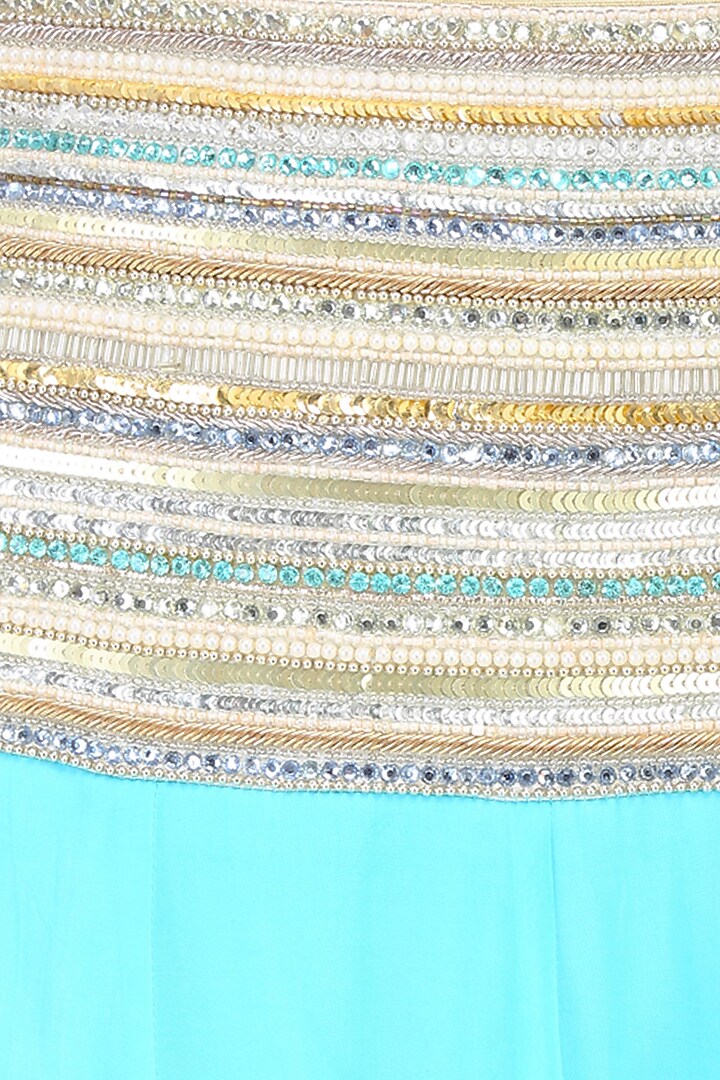 Light blue and gold zari embroidered lehenga set available only at Pernia's Pop Up Shop.