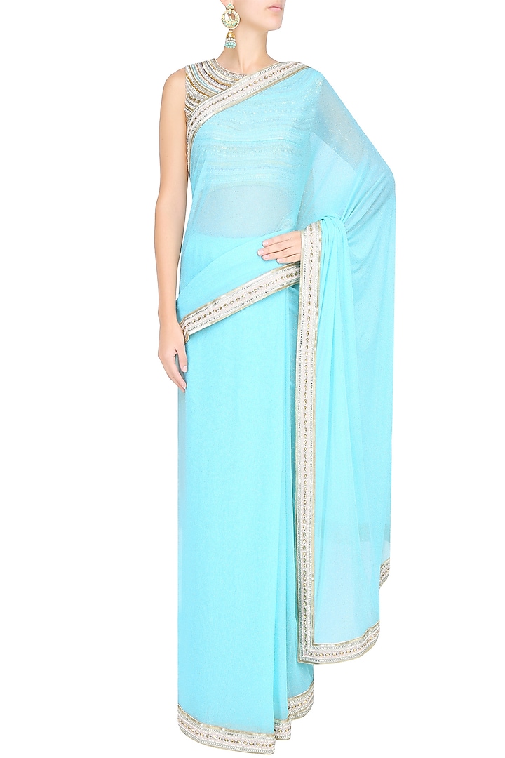 Light blue shimmer saree with sleeveless sequinned blouse available only at Pernia's Pop Up Shop.