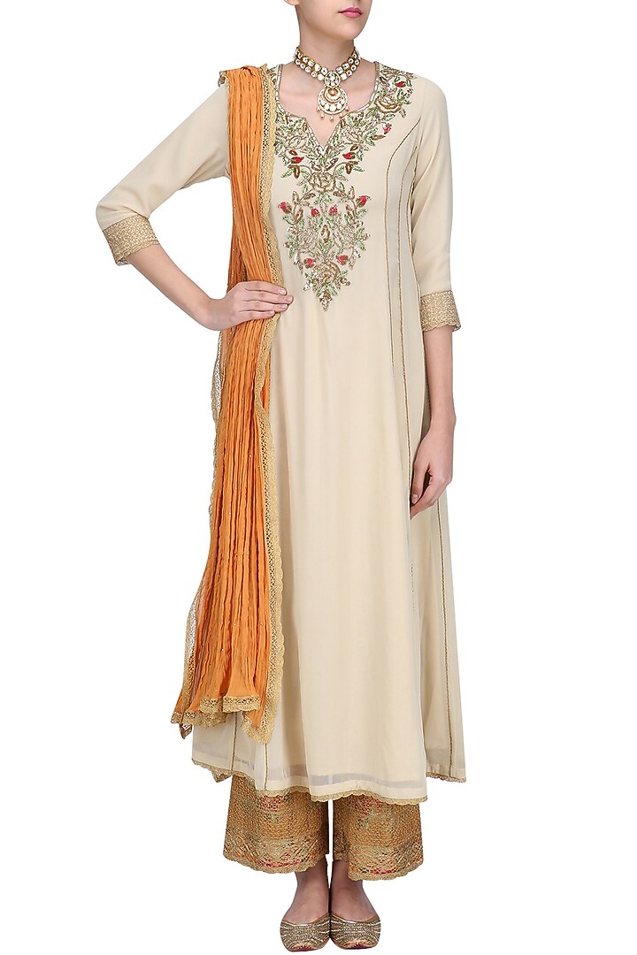 Beige floral embroidered kalidaar kurta set with orange dupatta available only at Pernia's Pop Up Shop.