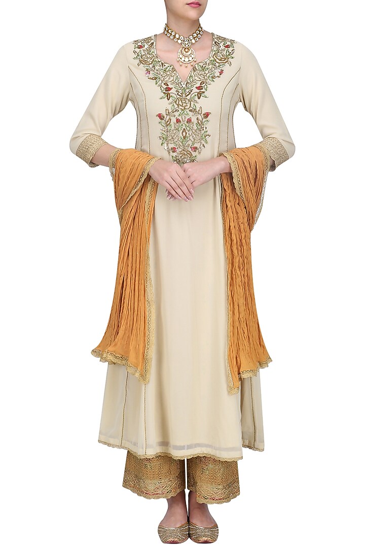 Beige floral embroidered kalidaar kurta set with orange dupatta available only at Pernia's Pop Up Shop.