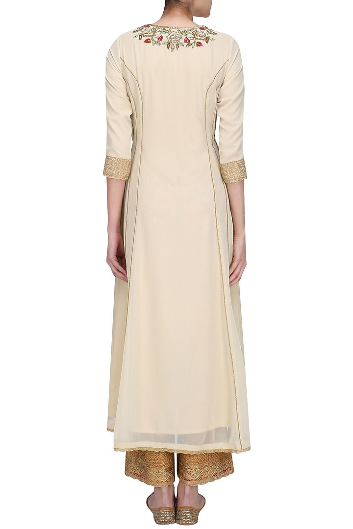 Beige floral embroidered kalidaar kurta set with orange dupatta available only at Pernia's Pop Up Shop.