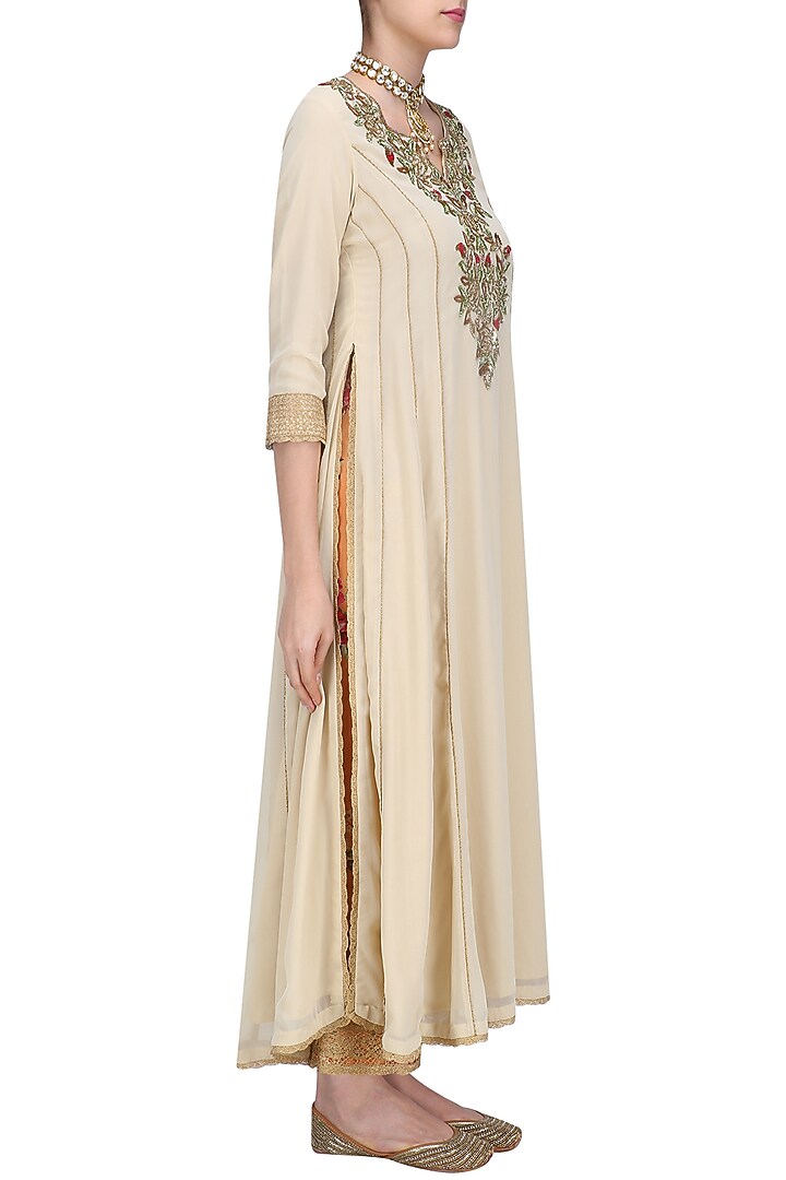 Beige floral embroidered kalidaar kurta set with orange dupatta available only at Pernia's Pop Up Shop.