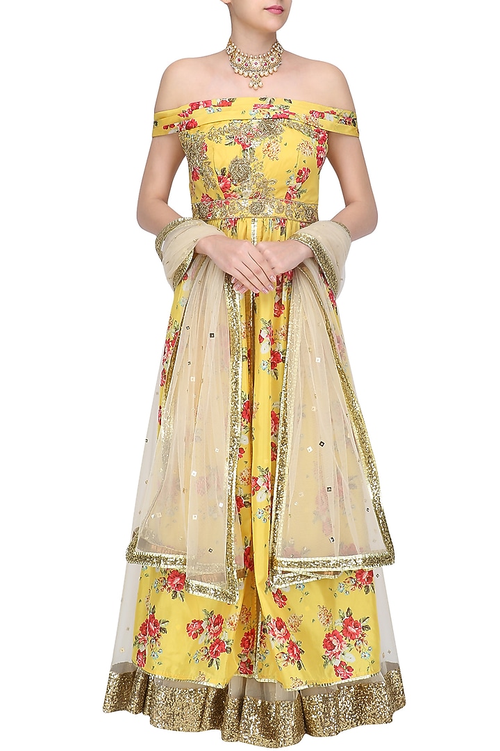 Yellow floral embroidered off shoulder kurta and skirt set available only at Pernia's Pop Up Shop.