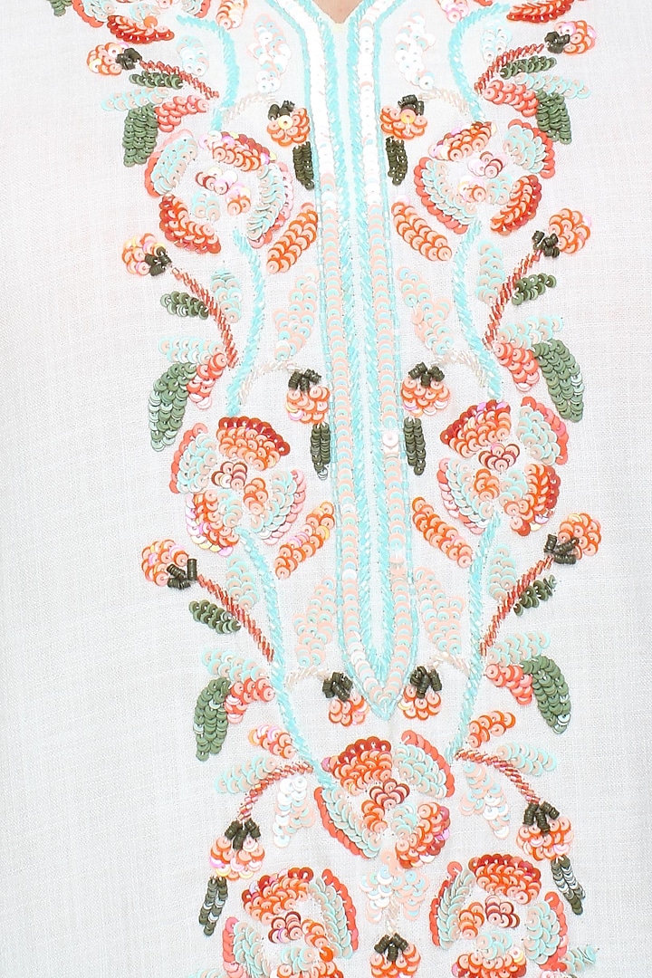 White floral embroidered straight kurta with blue floral broad pants available only at Pernia's Pop Up Shop.