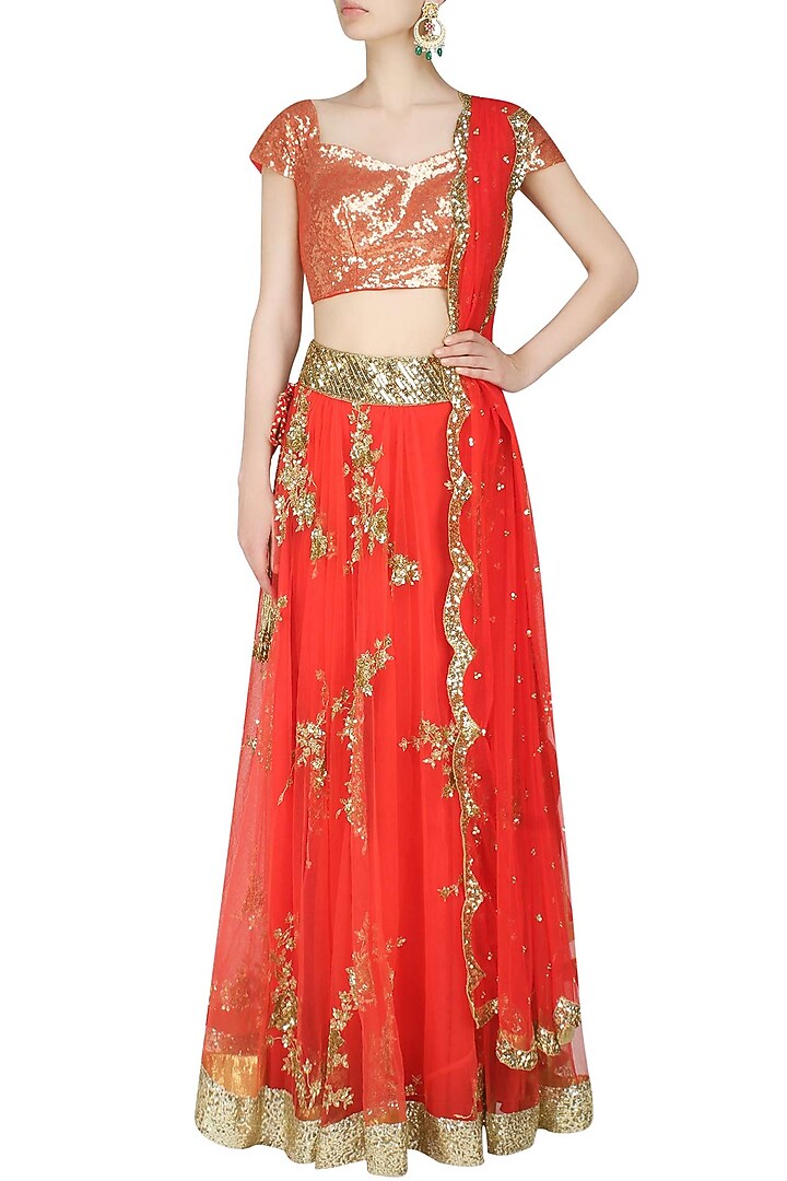 Tomato red cutdaana embroidered lehenga set available only at Pernia's Pop Up Shop.