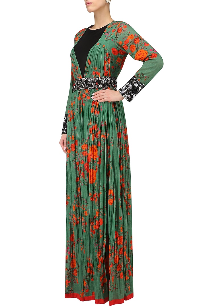 Green and red berry floral print cape jacket and black sleeveless jumpsuit set available only at Pernia's Pop Up Shop.