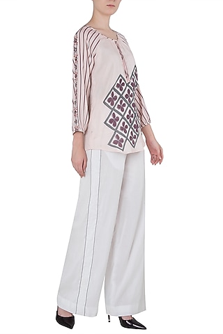 White Contrast Stitch Palazzo Pants by Saaksha & Kinni