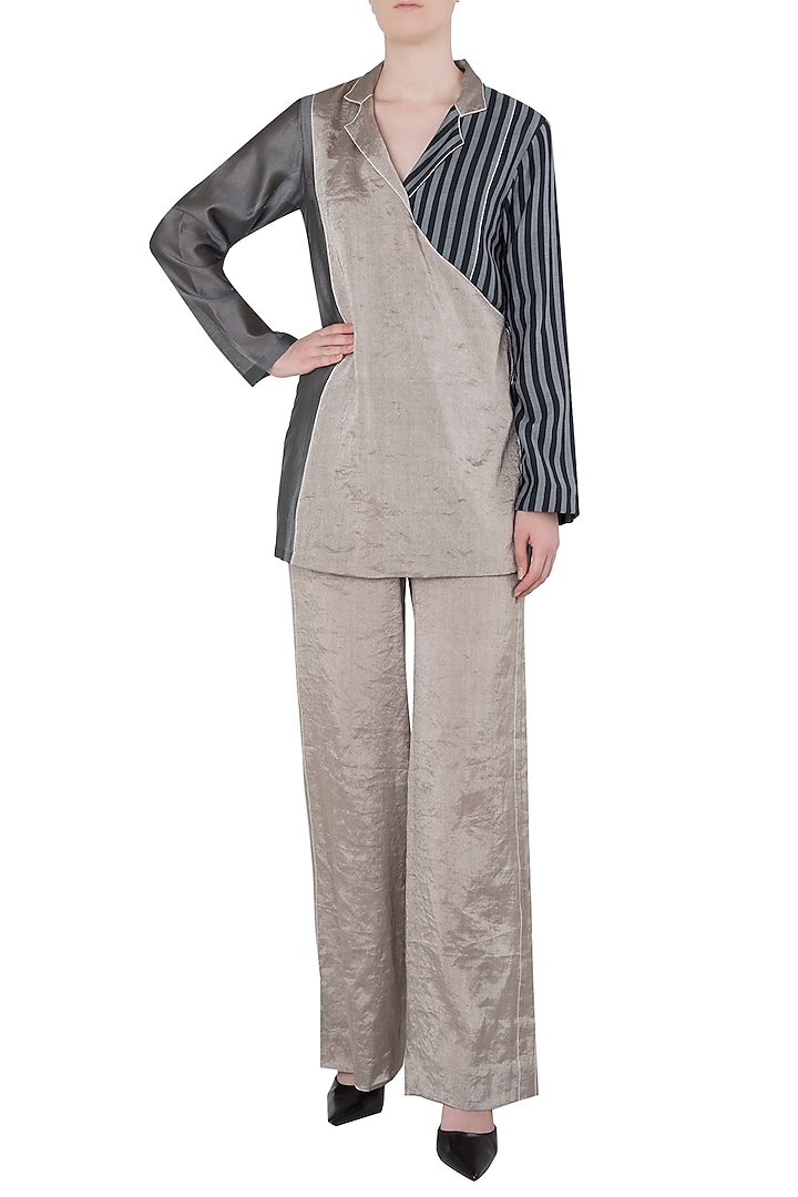 Silver wide leg pants available only at Pernia's Pop Up Shop.