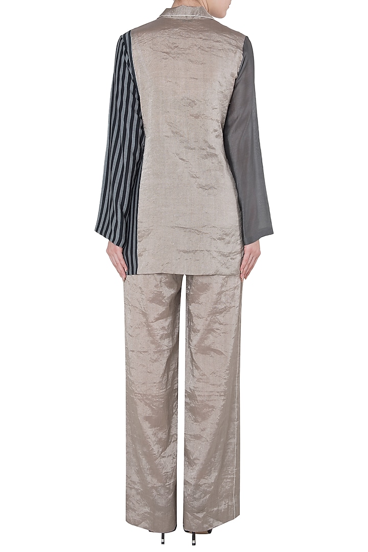 Silver wide leg pants available only at Pernia's Pop Up Shop.