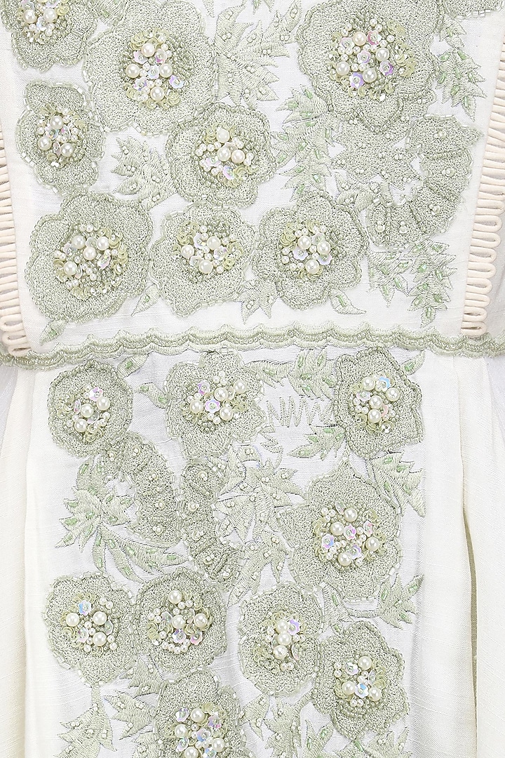 Ivory embroidered peplum top with palazzo pants available only at Pernia's Pop Up Shop.