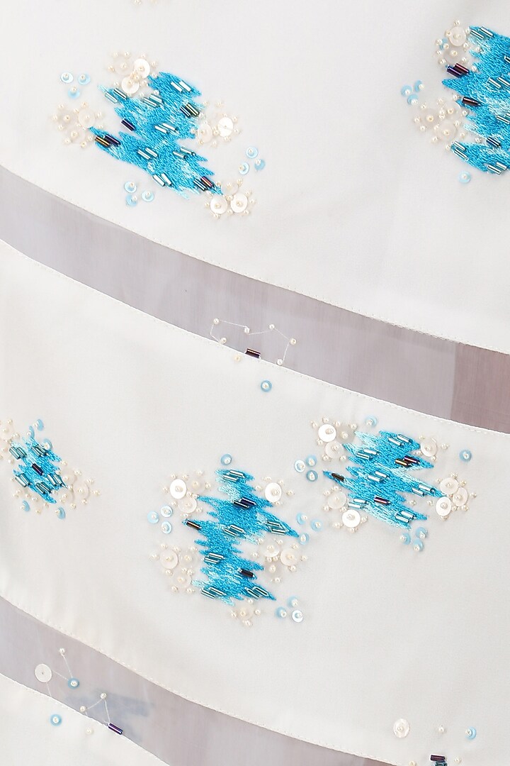 Ivory embroidered calf length skirt available only at Pernia's Pop Up Shop.