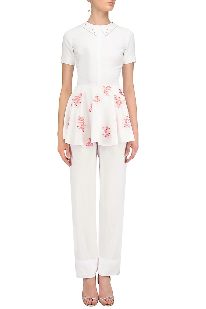 Ivory embroidered peplum top available only at Pernia's Pop Up Shop.